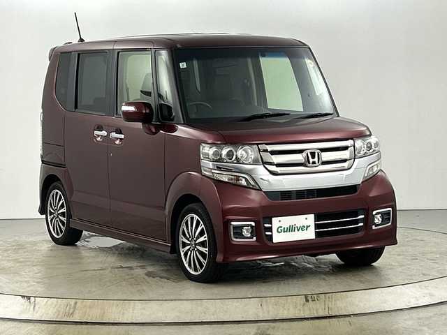 ホンダ Ｎ ＢＯＸ カスタム G ターボ Lパッケージ 愛知県 2015(平27)年 9.1万km プレミアムディープロッソパール 純正7インチＳＤナビ/（ＤＶＤ/ＣＤ/ワンセグ/Bluetooth/ＡＭ/ＦＭ）/バックカメラ/両側パワースライドドア/ハーフレザーシート/クルーズコントロール/スマートキー/キセノンライト/純正１５インチＡＷ/純正フロアマット/ＥＴＣ
