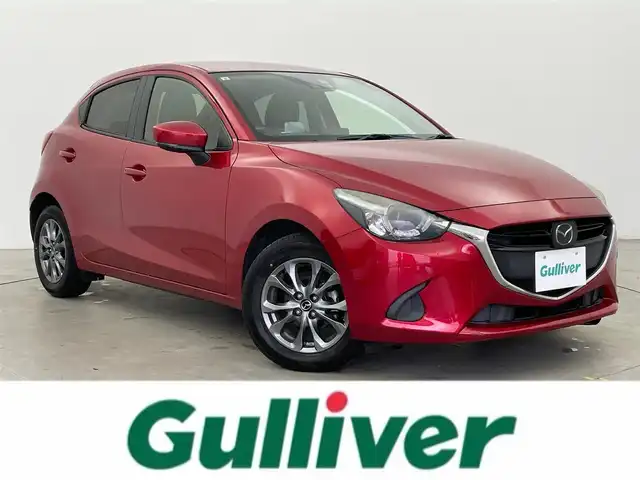 マツダ デミオ 13S ツーリング 富山県 2017(平29)年 4.6万km ソウルレッドプレミアムメタリック 純正ナビ/（AM/FM/CD/TV/DVD/BT)/フルセグテレビ/Bluetooth/レーダークルーズコントロール/リアパーキングセンサー/アイドリングストップ/前席シートヒーター/USB端子×2/AUX端子/純正フロアマット/プッシュスタート/スマートキー×2/オートライト/アダプティブLEDヘッドライト/車線逸脱警報システム/横滑り防止装置/ETC/ABS