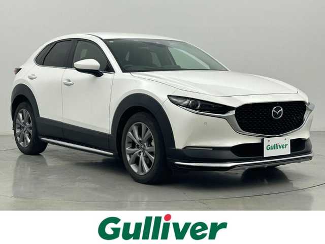 マツダ ＣＸ－３０ 20S Lパッケージ 熊本県 2021(令3)年 4.4万km スノーフレイクホワイトパールマイカ 禁煙車　/ワンオーナー　/ＢＯＳＥサウンド　/純正ナビ（ＣＤ・ＤＶＤ・フルセグ・ＢＴ・ＳＤ・ＵＳＢ・HDMI）/アラウンドビューモニター　/前方ドライブレコーダー　/アダブティブクルーズコントロール/ＥＴＣ　/衝突軽減ブレーキ/レーンキープアシスト/横滑り防止/ブラインドスポットモニター/前後クリアランスソナー　/前席シートヒーター/ステアリングヒーター/運転席パワーシート/シートメモリー/ヘッドアップディスプレイ/パワーバックドア/ハーフレザーシート/純正フロアマット/純正１８インチAW/オートライト/オートマチックハイビーム/LEDヘッドライト/スマートキー/プッシュスタート/スペアキー1本/保証書/取扱説明書