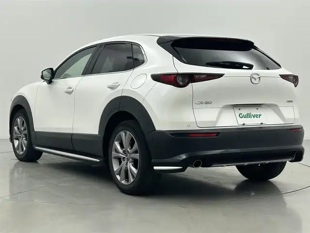 マツダ ＣＸ－３０ 20S Lパッケージ 熊本県 2021(令3)年 4.4万km スノーフレイクホワイトパールマイカ 禁煙車　/ワンオーナー　/ＢＯＳＥサウンド　/純正ナビ（ＣＤ・ＤＶＤ・フルセグ・ＢＴ・ＳＤ・ＵＳＢ・HDMI）/アラウンドビューモニター　/前方ドライブレコーダー　/アダブティブクルーズコントロール/ＥＴＣ　/衝突軽減ブレーキ/レーンキープアシスト/横滑り防止/ブラインドスポットモニター/前後クリアランスソナー　/前席シートヒーター/ステアリングヒーター/運転席パワーシート/シートメモリー/ヘッドアップディスプレイ/パワーバックドア/ハーフレザーシート/純正フロアマット/純正１８インチAW/オートライト/オートマチックハイビーム/LEDヘッドライト/スマートキー/プッシュスタート/スペアキー1本/保証書/取扱説明書