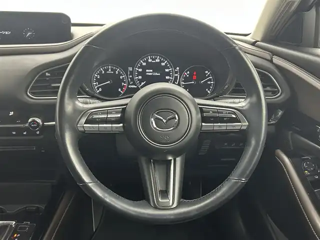 マツダ ＣＸ－３０ 20S Lパッケージ 熊本県 2021(令3)年 4.4万km スノーフレイクホワイトパールマイカ 禁煙車　/ワンオーナー　/ＢＯＳＥサウンド　/純正ナビ（ＣＤ・ＤＶＤ・フルセグ・ＢＴ・ＳＤ・ＵＳＢ・HDMI）/アラウンドビューモニター　/前方ドライブレコーダー　/アダブティブクルーズコントロール/ＥＴＣ　/衝突軽減ブレーキ/レーンキープアシスト/横滑り防止/ブラインドスポットモニター/前後クリアランスソナー　/前席シートヒーター/ステアリングヒーター/運転席パワーシート/シートメモリー/ヘッドアップディスプレイ/パワーバックドア/ハーフレザーシート/純正フロアマット/純正１８インチAW/オートライト/オートマチックハイビーム/LEDヘッドライト/スマートキー/プッシュスタート/スペアキー1本/保証書/取扱説明書