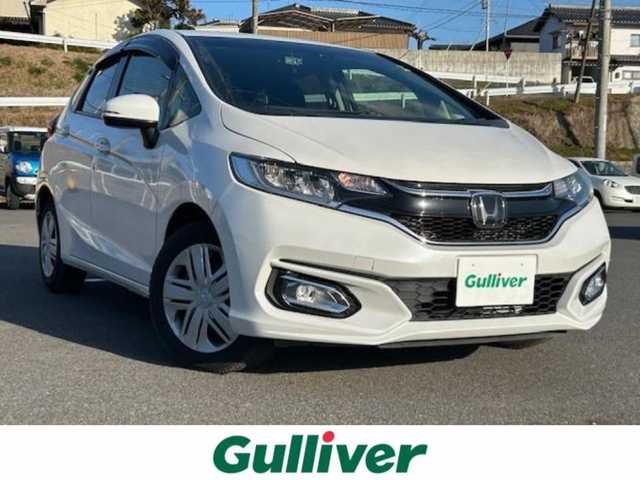 ホンダ フィット 13G L ホンダセンシング 岡山県 2019(平31)年 3.8万km パール 純正 SDナビ/(CD/DVD/BT/フルセグTV)/バックカメラ/衝突被害軽減システム/車線逸脱警報/クルーズコントロール/横滑り防止装置/ETC/ドライブレコーダー/アイドリングストップ/LEDヘッドライト/フォグランプ/オートライト/ウィンカーミラー/電動格納ミラー/純正アルミホイール/プッシュスタート/スマートキー/フロアマット/ドアバイザー