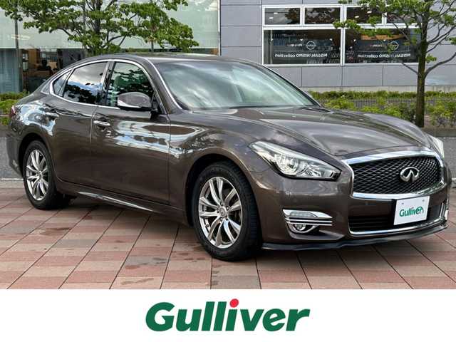 日産 フーガ 250GT 福島県 2015(平27)年 6.7万km 茶Ｍ カラー番号【CAN】プレミアムブラウンメタリック/純正ナビ/(CD/DVD/Bluetooth/フルセグTV)/アラウンドビューモニター/OP　本革パッケージ/ブラック革シート/前席シートヒーター/エアシート/OP　BOSEサラウンドサウンドシステム/全方位運転支援システム/エマージェンシーブレーキ/ディスタンスコントロールアシスト/インテリジェントクルーズコントロール/LEDオートライト/アクティブAFS/LEDフロントフォグ/ビルトインETC/インテリジェントキー/エンジンプッシュスタート/前席パワーシート/パワーオットマン(助手席)/純正フロアマット/保証書/取説/スペアキー/ドライブレコーダー