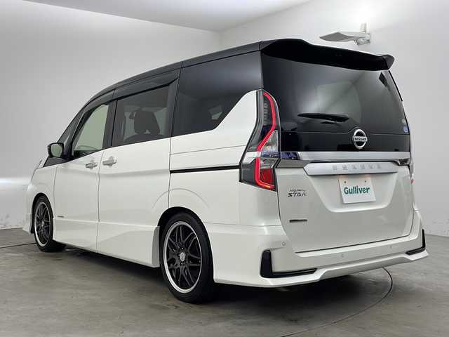 日産 セレナ ハイウェイスター V 兵庫県 2020(令2)年 2.8万km ブリリアントホワイトパール 2トーン ・純正10インチナビ＆フルセグ＆BT＆DVD＆BD/・アラウンドビューモニター/・純正フリップダウンモニター/・エマージェンシーブレーキ/・車線逸脱警報/・車線逸脱防止支援/・ブラインドスポットモニター/・踏み間違い衝突防止アシスト/・標識検知機能/・クリアランスソナー/・オートマチックハイビーム/・前後コーナーセンサー/・両側パワースライドドア/・左側ハンズフリーパワースライドドア/・社外18インチアルミホイール/・ローダウン/・エンジンスターター/・前方ドライブレコーダー/・クルーズコントロール/・アイドリングストップ/・スマートキー/・プッシュスタート/・LEDヘッドライト/・LEDフォグ/・オートライト/・電動パーキングブレーキ/・ブレーキホールド/・純正フロアマット