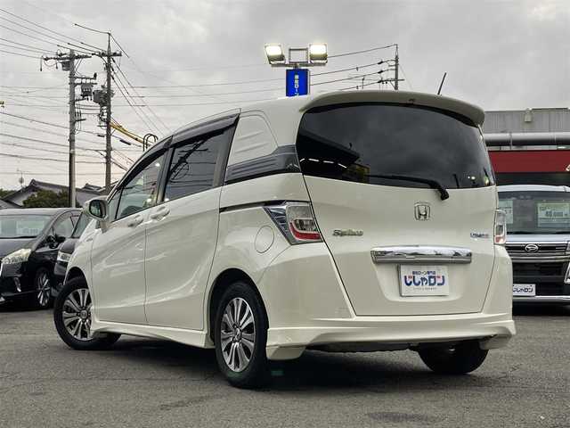 ホンダ フリード スパイク ハイブリット ジャストセレクション 静岡県 2012(平24)年 5.4万km プレミアムホワイトパール (株)IDOMが運営する【じしゃロン焼津店】の自社ローン専用車両になります。こちらは現金またはオートローンご利用時の価格です。自社ローンご希望の方は別途その旨お申付け下さい /社外ＳＤナビ/（フルセグＴＶ/ＣＤ/ＤＶＤ）/両側パワースライドドア/クルーズコントロール/バックカメラ/ＥＴＣ/ＨＩＤヘッドライト/オートライト/スマートキー