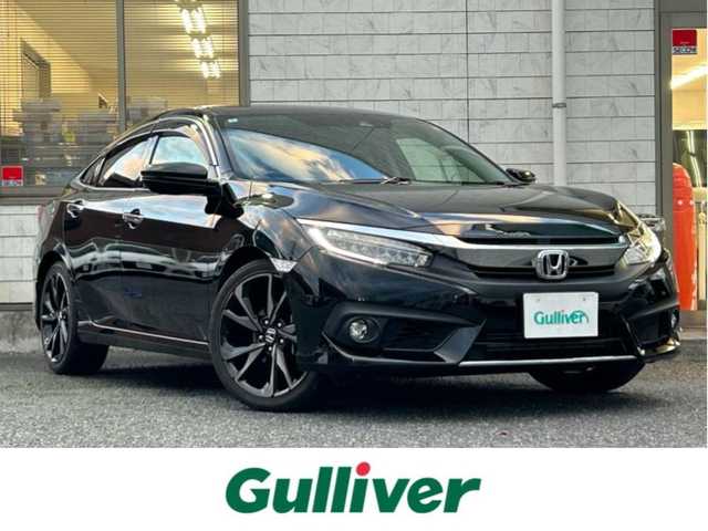 ホンダ シビック セダン 福岡県 2018(平30)年 4.8万km クリスタルブラックパール ワンオーナー/純正メモリナビ【VXM-185VFi】/　(AM/FM/CD/DVD/Bluetooth/フルセグTV)/バックカメラ/ホンダセンシング/・衝突軽減ブレーキ/・アダプティブクルーズコントロール/・車線維持支援/・路外逸脱抑制/・標識認識/横滑り防止/アイドリングストップ/ブレーキホールド/パーキングブレーキ/純正18インチアルミホイール/ビルトインETC/パドルシフト/革巻きステアリング/ステアリングスイッチ/黒レザーシート/パワーシート(D/N)/シートヒーター(D/N)/純正フロアマット/スペアキー×1/USBポート/アクセサリーソケット/ISOFIX/保証書/取扱説明書/ナビ取扱説明書