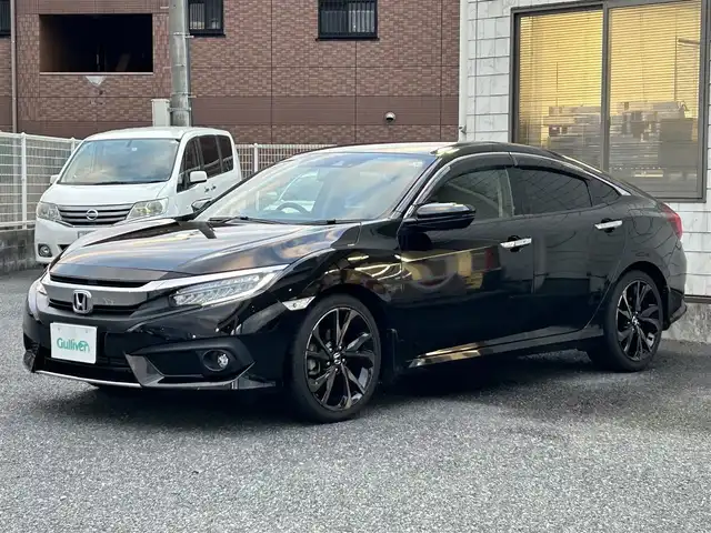 ホンダ シビック セダン 福岡県 2018(平30)年 4.8万km クリスタルブラックパール ワンオーナー/純正メモリナビ【VXM-185VFi】/　(AM/FM/CD/DVD/Bluetooth/フルセグTV)/バックカメラ/ホンダセンシング/・衝突軽減ブレーキ/・アダプティブクルーズコントロール/・車線維持支援/・路外逸脱抑制/・標識認識/横滑り防止/アイドリングストップ/ブレーキホールド/パーキングブレーキ/純正18インチアルミホイール/ビルトインETC/パドルシフト/革巻きステアリング/ステアリングスイッチ/黒レザーシート/パワーシート(D/N)/シートヒーター(D/N)/純正フロアマット/スペアキー×1/USBポート/アクセサリーソケット/ISOFIX/保証書/取扱説明書/ナビ取扱説明書