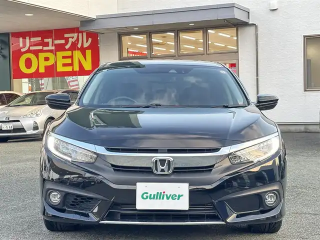 ホンダ シビック セダン 熊本県 2018(平30)年 4.8万km クリスタルブラックパール ワンオーナー/純正ナビ(VXM-185VFi)/【フルセグTV/Bluetooth/CD/DVD】/バックカメラ/クルーズコントロール/オートLEDライト/ブレーキホールド/ブラックレザーシート/前席シートヒーター/前席パワーシート/革巻きステアリング/ステアリングスイッチ/プッシュスタート/スマートキー/ETC/純正フロアマット/ドアバイザー/横滑り防止装置/ABS/盗難防止装置