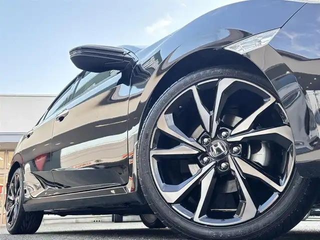 ホンダ シビック セダン 熊本県 2018(平30)年 4.8万km クリスタルブラックパール ワンオーナー/純正ナビ(VXM-185VFi)/【フルセグTV/Bluetooth/CD/DVD】/バックカメラ/クルーズコントロール/オートLEDライト/ブレーキホールド/ブラックレザーシート/前席シートヒーター/前席パワーシート/革巻きステアリング/ステアリングスイッチ/プッシュスタート/スマートキー/ETC/純正フロアマット/ドアバイザー/横滑り防止装置/ABS/盗難防止装置