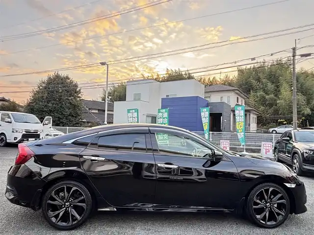ホンダ シビック セダン 熊本県 2018(平30)年 4.8万km クリスタルブラックパール ワンオーナー/純正ナビ(VXM-185VFi)/【フルセグTV/Bluetooth/CD/DVD】/バックカメラ/クルーズコントロール/オートLEDライト/ブレーキホールド/ブラックレザーシート/前席シートヒーター/前席パワーシート/革巻きステアリング/ステアリングスイッチ/プッシュスタート/スマートキー/ETC/純正フロアマット/ドアバイザー/横滑り防止装置/ABS/盗難防止装置