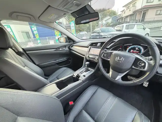ホンダ シビック セダン 熊本県 2018(平30)年 4.8万km クリスタルブラックパール ワンオーナー/純正ナビ(VXM-185VFi)/【フルセグTV/Bluetooth/CD/DVD】/バックカメラ/クルーズコントロール/オートLEDライト/ブレーキホールド/ブラックレザーシート/前席シートヒーター/前席パワーシート/革巻きステアリング/ステアリングスイッチ/プッシュスタート/スマートキー/ETC/純正フロアマット/ドアバイザー/横滑り防止装置/ABS/盗難防止装置