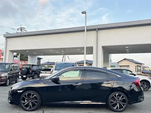 ホンダ シビック セダン 熊本県 2018(平30)年 4.8万km クリスタルブラックパール ワンオーナー/純正ナビ(VXM-185VFi)/【フルセグTV/Bluetooth/CD/DVD】/バックカメラ/クルーズコントロール/オートLEDライト/ブレーキホールド/ブラックレザーシート/前席シートヒーター/前席パワーシート/革巻きステアリング/ステアリングスイッチ/プッシュスタート/スマートキー/ETC/純正フロアマット/ドアバイザー/横滑り防止装置/ABS/盗難防止装置
