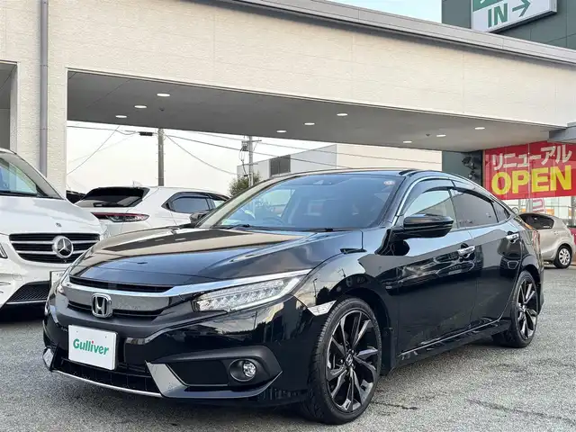 ホンダ シビック セダン 熊本県 2018(平30)年 4.8万km クリスタルブラックパール ワンオーナー/純正ナビ(VXM-185VFi)/【フルセグTV/Bluetooth/CD/DVD】/バックカメラ/クルーズコントロール/オートLEDライト/ブレーキホールド/ブラックレザーシート/前席シートヒーター/前席パワーシート/革巻きステアリング/ステアリングスイッチ/プッシュスタート/スマートキー/ETC/純正フロアマット/ドアバイザー/横滑り防止装置/ABS/盗難防止装置