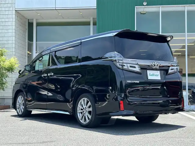 トヨタ ヴェルファイア Z ゴールデンアイズ 愛媛県 2020(令2)年 4.4万km ブラック ワンオーナー/純正9インチナビ/（AM/FM/BT）/バックカメラ/ドライブレコーダー/ビルドインETC/両側パワースライドドア/パワーバックドア/ハーフレザーシート/3列シート/衝突被害軽減システム/オートホールド付電子パーキング/レーダークルーズコントロール/コーナーセンサー/横滑り防止装置/純正LEDライト/オートライト/フォグランプ/純正18インチAW/社外フロアマット/ステアリングスイッチ/スマートキー/取扱説明書/保証書