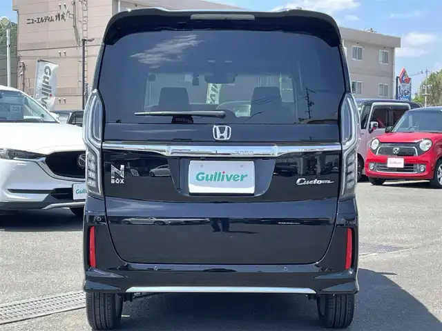 ホンダ Ｎ ＢＯＸ カスタム L ターボ 広島県 2021(令3)年 0.7万km クリスタルブラックパール 社外メモリナビ(CN-E330D)/(CD/BT/ワンセグ)/バックカメラ/両側パワースライドドア/ホンダセンシング/D/N席シートヒーター/純正AW15インチ/LEDヘッドライト/オートライト/ドラレコ/ETC/革巻きハンドル/ステアリングリモコン/スマートキー/オートリトラミラー/アレルクリーンプラスシート/プラズマクラスター搭載フルオート・エアコンディショナー/運転席＆助手席シートバックテーブル/プライムスムース＆トリコットコンビシート/保証書/取扱説明書/ナビ取説