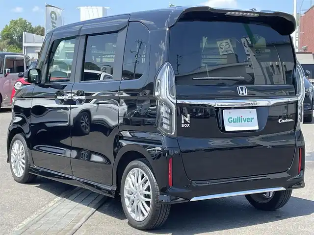ホンダ Ｎ ＢＯＸ カスタム L ターボ 広島県 2021(令3)年 0.7万km クリスタルブラックパール 社外メモリナビ(CN-E330D)/(CD/BT/ワンセグ)/バックカメラ/両側パワースライドドア/ホンダセンシング/D/N席シートヒーター/純正AW15インチ/LEDヘッドライト/オートライト/ドラレコ/ETC/革巻きハンドル/ステアリングリモコン/スマートキー/オートリトラミラー/アレルクリーンプラスシート/プラズマクラスター搭載フルオート・エアコンディショナー/運転席＆助手席シートバックテーブル/プライムスムース＆トリコットコンビシート/保証書/取扱説明書/ナビ取説