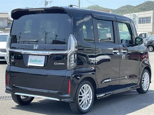 ホンダ Ｎ ＢＯＸ カスタム L ターボ 広島県 2021(令3)年 0.7万km クリスタルブラックパール 社外メモリナビ(CN-E330D)/(CD/BT/ワンセグ)/バックカメラ/両側パワースライドドア/ホンダセンシング/D/N席シートヒーター/純正AW15インチ/LEDヘッドライト/オートライト/ドラレコ/ETC/革巻きハンドル/ステアリングリモコン/スマートキー/オートリトラミラー/アレルクリーンプラスシート/プラズマクラスター搭載フルオート・エアコンディショナー/運転席＆助手席シートバックテーブル/プライムスムース＆トリコットコンビシート/保証書/取扱説明書/ナビ取説