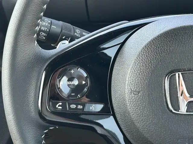 ホンダ Ｎ ＢＯＸ カスタム L ターボ 広島県 2021(令3)年 0.7万km クリスタルブラックパール 社外メモリナビ(CN-E330D)/(CD/BT/ワンセグ)/バックカメラ/両側パワースライドドア/ホンダセンシング/D/N席シートヒーター/純正AW15インチ/LEDヘッドライト/オートライト/ドラレコ/ETC/革巻きハンドル/ステアリングリモコン/スマートキー/オートリトラミラー/アレルクリーンプラスシート/プラズマクラスター搭載フルオート・エアコンディショナー/運転席＆助手席シートバックテーブル/プライムスムース＆トリコットコンビシート/保証書/取扱説明書/ナビ取説