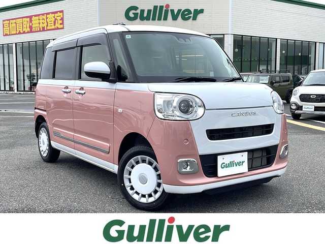 ダイハツ ムーヴ キャンバス ストライプス G 鳥取県 2024(令6)年 0.5万km シャイニングホワイトパール/アプリコットピンクメタリック ４・W・D/ワンオーナー/ツートンカラー/パール/ピンク/純正9インチディスプレイオーディオ/（フルセグ/BT/HDMI/USB）/スマートアシスト/レーンキープアシスト/両側パワースライドドア/前席シートヒーター/ホットカップホルダー/LEDヘットライト/プッシュエンジンスタート/アイドリングストップ/ワイヤレス充電機能/純正フロアマット/ドアバイザー/フロアマット/スマートキー×２/保証書・取扱説明書