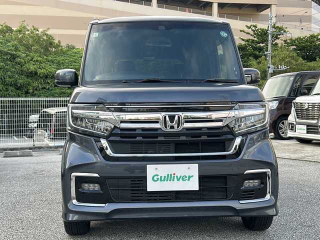 ホンダ Ｎ ＢＯＸ カスタム L 沖縄県 2022(令4)年 2.9万km メテオロイドグレーメタリック 社外ナビ　ＡＭ／ＦＭ／ＣＤ／ＤＶＤ　/Ｂｕｌｅｔｏｏｔｈ　/フルセグＴＶ　/バックモニター　/片側パワスラ　/ＥＴＣ　/追従クルーズコントロール　/レーンキープアシスト　/電動パーキングブレーキ　/衝突軽減装置