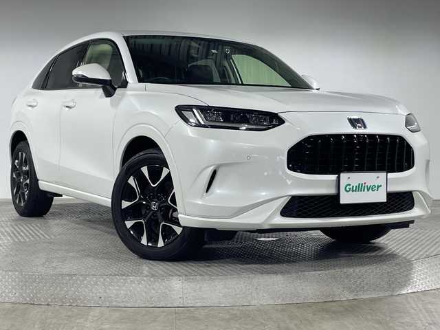 ホンダ ＺＲ－Ｖ ハイブリッド e:HEV Z 神奈川県 2022(令4)年 3.7万km プラチナホワイトパール ホンダセンシング/・衝突軽減ブレーキ/・歩行者事故低減ステアリング/・路外逸脱抑制機能/・車線維持支援システム/・渋滞追従機能付きアダプティブクルーズコントロール/・トラフィックジャムアシスト/・誤発進抑制機能/・近距離衝突軽減ブレーキ/・パーキングセンサーシステム/・オートハイビーム/純正ナビ/・BT/フルセグTV/AppleCarPlay/AndroidAuto/USB/AM/FM/レザーシート/シートヒーター(D/N)/パワーシート(D/N)/シートメモリー(D)/BOSEスピーカー/Qi充電/BSM/電動サイドブレーキ/オートブレーキホールド/ビルトインETC2.0/ドライブレコーダー/パワーバックドア/革巻きステアリング/ステアリングスイッチ/ステアリングヒーター/パドルシフト/Autoライト/スマートキー/スペアキー/プッシュスタートボタン/ダウンヒルアシスト/自動防眩ミラー/SOSコール/LEDヘッドライト/フォグランプ/純正フロアマット/純正アルミホイール/純正ドアバイザー