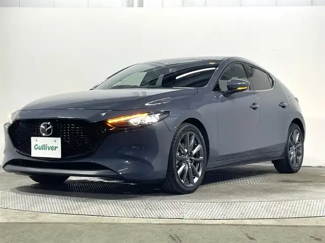 マツダ マツダ３ファストバック 15S ツーリング 大阪府 2021(令3)年 2.7万km ポリメタルグレーM 純正10.25incナビTV 360カメラ レーダークルコン 衝突軽減ブレーキ レーンアシスト ブラインドSM スマートキー Pスタート クリアランスソナー アイドリングストップ 前後ドライブレコーダー ETC