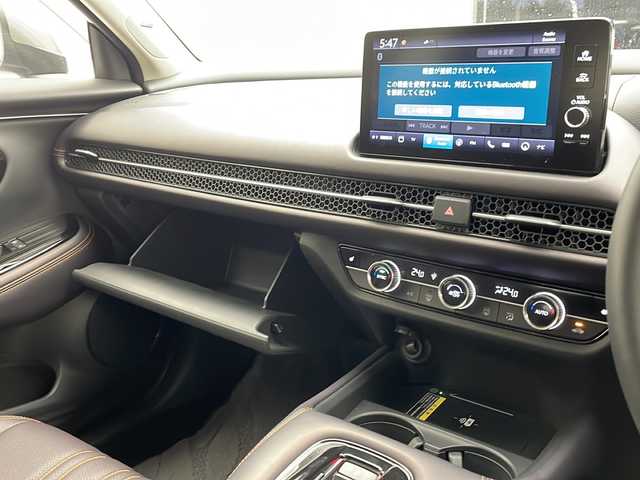 ホンダ ＺＲ－Ｖ ハイブリッド e:HEV Z 沖縄県 2023(令5)年 1.5万km スーパープラチナグレーメタリック 純正ナビ　/　(フルセグTV Bluetooth FM/AM)/マルチビューカメラシステム/ＢＯＳＥサウンド　/ETC2.0/前後ドライブレコーダー　/ホンダセンシング　/レザーシート　/パワーシート　/シートヒーター　/パドルシフト　/ステアリングスイッチ/ステアリングヒーター/クルーズコントロール/クリアランスソナー/LEDヘッドライト/オートライト/純正フロアマット/ＲＡＹＳホイール　/スマートキー/スペアキー/プッシュスタート/保証書/取扱説明書