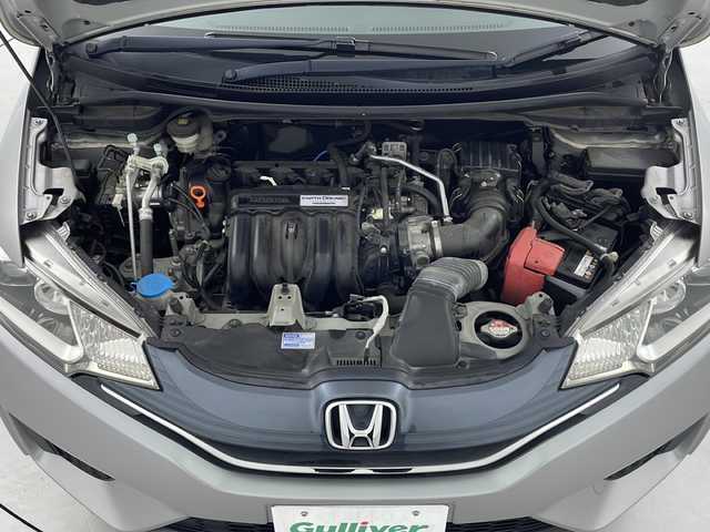 ホンダ フィット 13G Lパッケージ 岐阜県 2014(平26)年 5.7万km ティンテッドシルバーM 純正ナビ(VXM-145VSi)/CD/DVD/Bluetooth/SD/ワンセグTV/バックカメラ/ETC/シティブレーキアクティブシステム/LEDヘッドランプ/オートライト/オートエアコン/スペアキー/スマートキー/プッシュスタート/SRSエアバック（運転席・助手席・サイド・カーテン）/純正フロアマット/純正ドアバイザー/横滑り防止装置/盗難防止装置