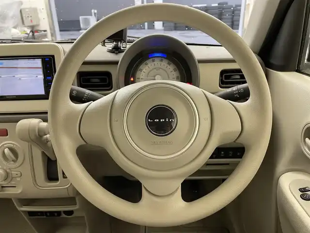 スズキ ラパン G 滋賀県 2024(令6)年 1万km テラコッタピンクメタリック 社外ナビ/(CD/DVD/フルセグ/Bluetooth)/バックカメラ/リアソナー/アイドリングストップ/シートヒーター(D席)/衝突軽減/横滑り防止/フォグランプ/スマートキー/スペアキー/プッシュスタート/純正ドアバイザー