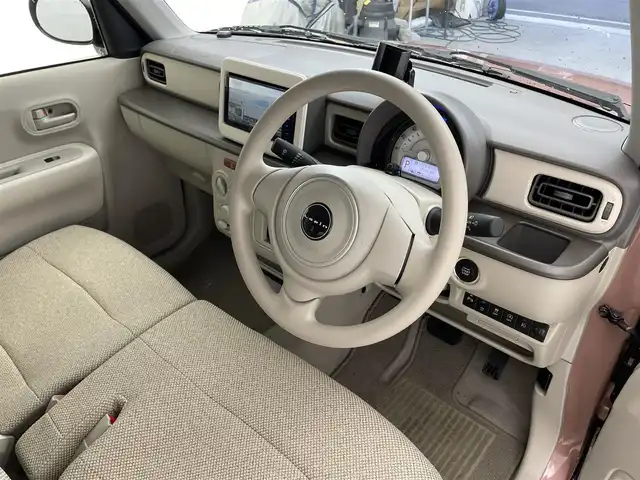 スズキ ラパン G 滋賀県 2024(令6)年 1万km テラコッタピンクメタリック 社外ナビ/(CD/DVD/フルセグ/Bluetooth)/バックカメラ/リアソナー/アイドリングストップ/シートヒーター(D席)/衝突軽減/横滑り防止/フォグランプ/スマートキー/スペアキー/プッシュスタート/純正ドアバイザー