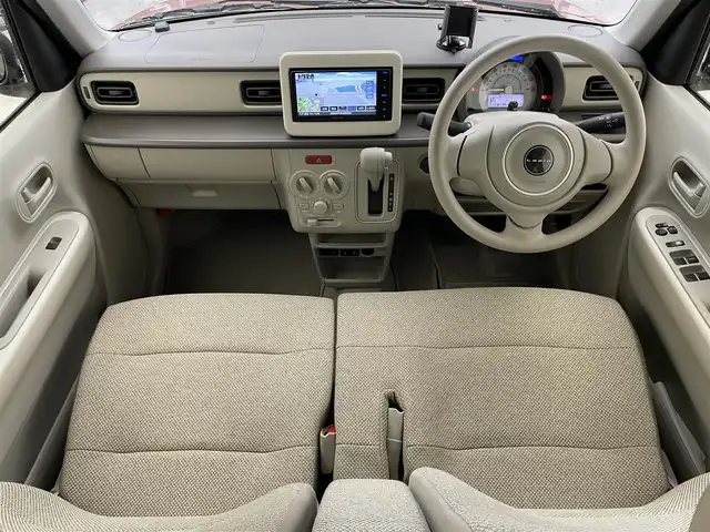 スズキ ラパン G 滋賀県 2024(令6)年 1万km テラコッタピンクメタリック 社外ナビ/(CD/DVD/フルセグ/Bluetooth)/バックカメラ/リアソナー/アイドリングストップ/シートヒーター(D席)/衝突軽減/横滑り防止/フォグランプ/スマートキー/スペアキー/プッシュスタート/純正ドアバイザー