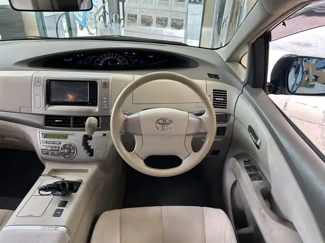 トヨタ エスティマ ハイブリッド X 東京都 2008(平20)年 16.7万km ホワイトパールクリスタルシャイン 純正ディーラーナビ/(NHZT-W58)/(CD/DVD/HDD/フルセグＴＶ/AUX)/純正フリップダウンモニター/キャプテンシート/セカンドシートオットマン/左側パワースライドドア/イージークローザードア/電動格納ミラー/オートライト/HID/フォグランプ/ドアバイザー/AC100V電源/AFS/ETC/リアプライバシーガラス/横滑り防止機能/オートエアコン/新車時保証書/取扱説明書/スマートキー/プッシュスタート/ABS＆WSRS