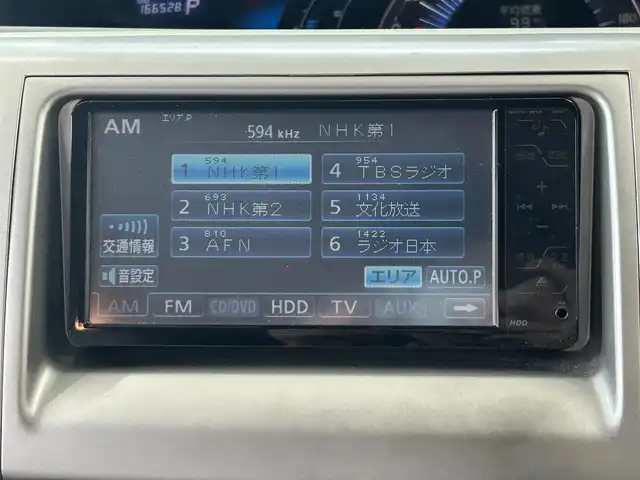トヨタ エスティマ ハイブリッド X 東京都 2008(平20)年 16.7万km ホワイトパールクリスタルシャイン 純正ディーラーナビ/(NHZT-W58)/(CD/DVD/HDD/フルセグＴＶ/AUX)/純正フリップダウンモニター/キャプテンシート/セカンドシートオットマン/左側パワースライドドア/イージークローザードア/電動格納ミラー/オートライト/HID/フォグランプ/ドアバイザー/AC100V電源/AFS/ETC/リアプライバシーガラス/横滑り防止機能/オートエアコン/新車時保証書/取扱説明書/スマートキー/プッシュスタート/ABS＆WSRS