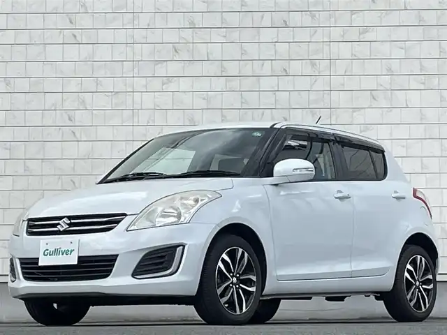 スズキ スイフト スタイル－DJE 岩手県 2015(平27)年 8万km スノーホワイトパール 禁煙車/4WD/クルーズコントロール/社外ナビ/→フルセグTV/Bluetooth/CD/DVD/FM/AM/バックカメラ/ステアリングスイッチ（ナビ連動）/前席シートヒーター/パドルシフト/横滑り防止装置/〇プッシュスタート/〇電動格納ミラー/〇ウィンカーミラー/〇フロアマット/〇ドアバイザー/〇シガーソケット/スペアキー