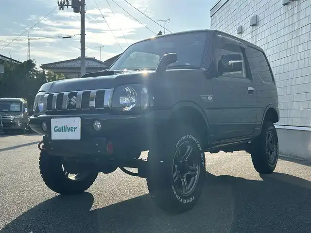 スズキ ジムニー ランドベンチャー 山形県 2017(平29)年 12.8万km ブルーイッシュブラックパール3 4WD/禁煙車/リフトアップ/社外F＆Rバンパー/社外マフラー/社外テールランプ/社外サス&ラテラルロッド/社外SDナビ/FM/AM/USB/DVD/SD/シートヒーター（D）/前席ドライブレコーダー/ダブルエアバック/純正バイザー/保証書/取扱説明書