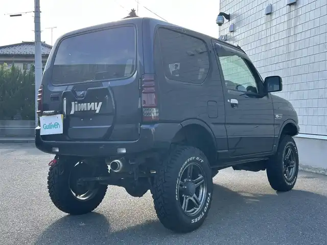 スズキ ジムニー ランドベンチャー 山形県 2017(平29)年 12.8万km ブルーイッシュブラックパール3 4WD/禁煙車/リフトアップ/社外F＆Rバンパー/社外マフラー/社外テールランプ/社外サス&ラテラルロッド/社外SDナビ/FM/AM/USB/DVD/SD/シートヒーター（D）/前席ドライブレコーダー/ダブルエアバック/純正バイザー/保証書/取扱説明書