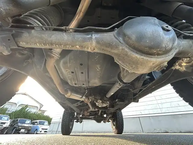 スズキ ジムニー ランドベンチャー 山形県 2017(平29)年 12.8万km ブルーイッシュブラックパール3 4WD/禁煙車/リフトアップ/社外F＆Rバンパー/社外マフラー/社外テールランプ/社外サス&ラテラルロッド/社外SDナビ/FM/AM/USB/DVD/SD/シートヒーター（D）/前席ドライブレコーダー/ダブルエアバック/純正バイザー/保証書/取扱説明書