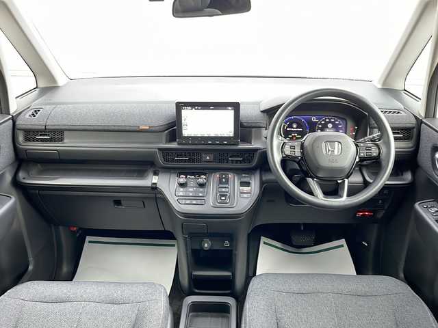 ホンダ ステップワゴン eHEV エアー 山形県 2022(令4)年 6.9万km プラチナホワイトパール Honda SENSING/・衝突軽減ブレーキ（ＣＭＢＳ）/・路外逸脱抑制機能/・先行車発進お知らせ機能/・アダプティブクルーズコントロール（ＡＣＣ）/・車線維持支援システム（ＬＫＡＳ）/・標識認識機能/・誤発進抑制機能 /・近距離衝突軽減ブレーキ/両側パワースライドドア/純正ナビ’(CD.DVD.BT.SD.USB)/フルセグ/バックカメラ/純正ドライブレコーダー/電動パーキングブレーキ/オートホールド/LEDヘッドライト/プッシュスタート/スマートキー