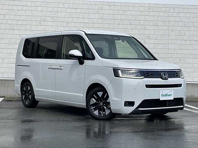 ホンダ ステップワゴン eHEV エアー 山形県 2022(令4)年 6.9万km プラチナホワイトパール Honda SENSING/・衝突軽減ブレーキ（ＣＭＢＳ）/・路外逸脱抑制機能/・先行車発進お知らせ機能/・アダプティブクルーズコントロール（ＡＣＣ）/・車線維持支援システム（ＬＫＡＳ）/・標識認識機能/・誤発進抑制機能 /・近距離衝突軽減ブレーキ/両側パワースライドドア/純正ナビ’(CD.DVD.BT.SD.USB)/フルセグ/バックカメラ/純正ドライブレコーダー/電動パーキングブレーキ/オートホールド/LEDヘッドライト/プッシュスタート/スマートキー