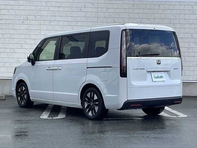 ホンダ ステップワゴン eHEV エアー 山形県 2022(令4)年 6.9万km プラチナホワイトパール Honda SENSING/・衝突軽減ブレーキ（ＣＭＢＳ）/・路外逸脱抑制機能/・先行車発進お知らせ機能/・アダプティブクルーズコントロール（ＡＣＣ）/・車線維持支援システム（ＬＫＡＳ）/・標識認識機能/・誤発進抑制機能 /・近距離衝突軽減ブレーキ/両側パワースライドドア/純正ナビ’(CD.DVD.BT.SD.USB)/フルセグ/バックカメラ/純正ドライブレコーダー/電動パーキングブレーキ/オートホールド/LEDヘッドライト/プッシュスタート/スマートキー