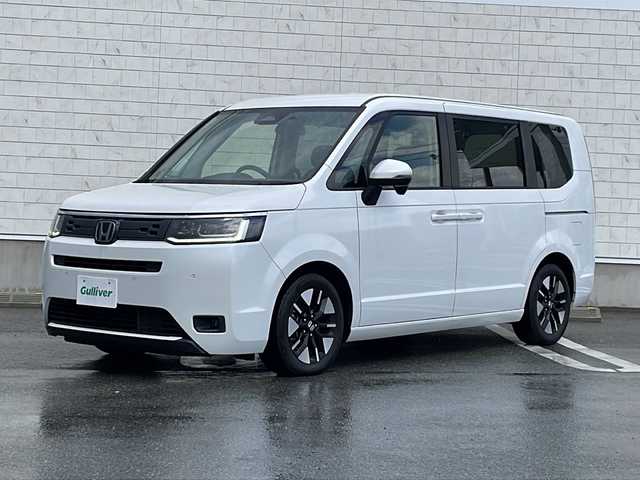 ホンダ ステップワゴン eHEV エアー 山形県 2022(令4)年 6.9万km プラチナホワイトパール Honda SENSING/・衝突軽減ブレーキ（ＣＭＢＳ）/・路外逸脱抑制機能/・先行車発進お知らせ機能/・アダプティブクルーズコントロール（ＡＣＣ）/・車線維持支援システム（ＬＫＡＳ）/・標識認識機能/・誤発進抑制機能 /・近距離衝突軽減ブレーキ/両側パワースライドドア/純正ナビ’(CD.DVD.BT.SD.USB)/フルセグ/バックカメラ/純正ドライブレコーダー/電動パーキングブレーキ/オートホールド/LEDヘッドライト/プッシュスタート/スマートキー