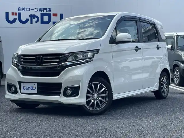 ホンダ Ｎ ＷＧＮ カスタム G ターボパッケージ 埼玉県 2014(平26)年 9万km プレミアムホワイトパール (株)IDOMが運営する【じしゃロン鳩ヶ谷店】の自社ローン専用車両になりますこちらは現金またはオートローンご利用時の価格です。自社ローンご希望の方は別途その旨お申付け下さい/純正インターナビ/　AM/FM/CD/DVD/BT/TV/バックカメラ/ターボ/無限グリルガーニッシュ/無限ドアハンドルプロテクター/無限フロアマット/ＣＴＢＡ/パドルシフト　/クルーズコントロール/ステアリングスイッチ/革巻きステアリング/ＥＴＣ/純正アルミホイール/プラズマクラスター/フォグランプ/プッシュスタートボタン/　スマートキー×1/電動格納式ウィンカーミラー/ドアバイザー