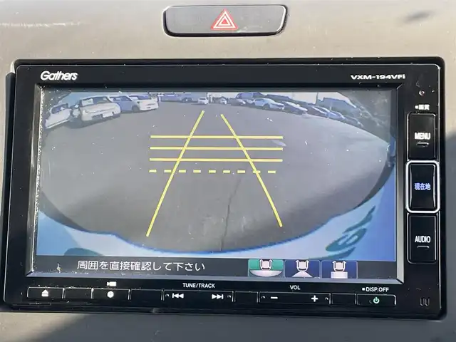 ホンダ フリード ハイブリット EX 岡山県 2019(平31)年 4.7万km フォレストグリーンパール 登録時走行距離47022km/純正ナビ/フルセグTV(AM/FM/CD/DVD/Bluetooth)/バックカメラ/両側パワースライドドア/ビルトインETC/ドライブレコーダー/デジタルインナーミラー/ホンダセンシング/・衝突軽減ブレーキ/・路外逸脱抑制機能/・アダプティブクルーズコントロール/・レーンキープアシスト/横滑り防止装置/D/N席シートヒーター/オートライト/15インチ社外AW/プッシュスタート/スマートキー