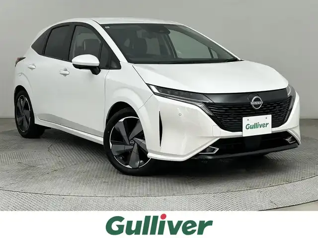 日産 オーラ G FOUR 道央・札幌 2024(令6)年 1.6万km ピュアホワイトパール ・４WD/・寒冷地仕様/・BOSEサウンド/・純正メモリナビ/・BT/USB/appleCarPlay/AndoroidAuto/フルセグ/・ビルトインETC2.0/・アラウンドビューモニター/・プロパイロット/・レーダークルーズコントロール/・エマージェンシーブレーキ/・前後コーナーセンサー/・ブラインドスポットモニター/・アイドリングストップ/・レーンキープアシスト/・ステアリングヒーター/・ステアリングリモコン/・ハーフレザーシート/・LEDヘッドライト/・オートライト/・置くだけ充電/・インテリジェントミラー/・SOSボタン/・スマートキー/・プッシュスタート