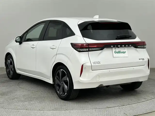 日産 オーラ G FOUR 道央・札幌 2024(令6)年 1.6万km ピュアホワイトパール ・４WD/・寒冷地仕様/・BOSEサウンド/・純正メモリナビ/・BT/USB/appleCarPlay/AndoroidAuto/フルセグ/・ビルトインETC2.0/・アラウンドビューモニター/・プロパイロット/・レーダークルーズコントロール/・エマージェンシーブレーキ/・前後コーナーセンサー/・ブラインドスポットモニター/・アイドリングストップ/・レーンキープアシスト/・ステアリングヒーター/・ステアリングリモコン/・ハーフレザーシート/・LEDヘッドライト/・オートライト/・置くだけ充電/・インテリジェントミラー/・SOSボタン/・スマートキー/・プッシュスタート