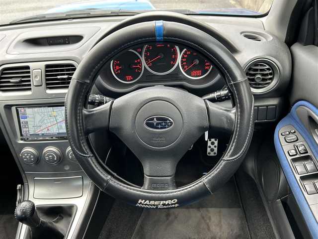 スバル インプレッサ ＷＲＸ 茨城県 2005(平17)年 8.1万km WRブルーマイカ 社外ナビ/Bluetooth/DVD再生機能/フルセグTV/純正スポーツシート/純正ゴールドホイール/ターボエンジン/フロアマット純正/パワーウィンドウ/リモコンキー/ABS/ETC