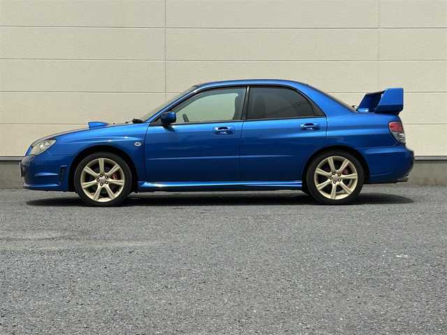 スバル インプレッサ ＷＲＸ 茨城県 2005(平17)年 8.1万km WRブルーマイカ 社外ナビ/Bluetooth/DVD再生機能/フルセグTV/純正スポーツシート/純正ゴールドホイール/ターボエンジン/フロアマット純正/パワーウィンドウ/リモコンキー/ABS/ETC