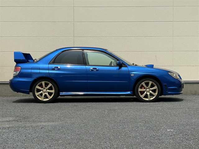 スバル インプレッサ ＷＲＸ 茨城県 2005(平17)年 8.1万km WRブルーマイカ 社外ナビ/Bluetooth/DVD再生機能/フルセグTV/純正スポーツシート/純正ゴールドホイール/ターボエンジン/フロアマット純正/パワーウィンドウ/リモコンキー/ABS/ETC