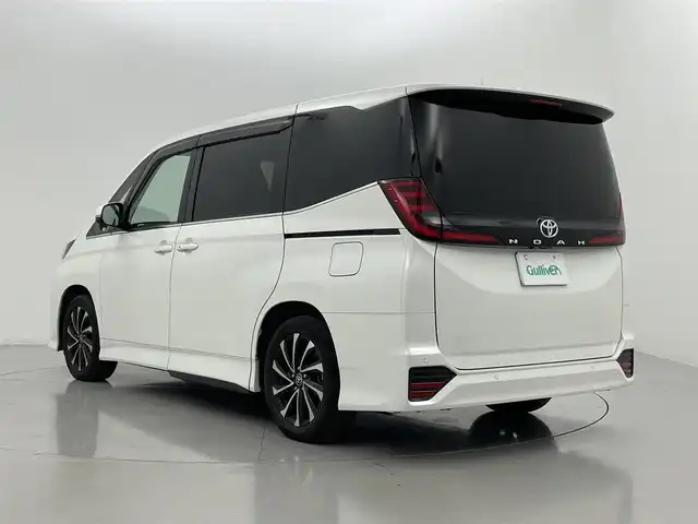 トヨタ ノア S－Z 熊本県 2023(令5)年 3.6万km ホワイトパールクリスタルシャイン 純正ナビ（ＣＤ・ＤＶＤ・フルセグ・ＢＴ）/バックカメラ　/純正フリップダウンモニター　/ビルトインＥＴＣ２．０　/レーダークルーズコントロール/両側パワースライドドア　/前後クリアランスソナー/快適利便パッケージ/レーンキープアシスト/横滑り防止/パワーバックドア　/ステアリングヒーター/2列目オットマン/純正フロアマット/純正17インチAW/オートライト/オートマチックハイビーム/LEDヘッドライト/フォグランプ/スマートキー/プッシュスタート