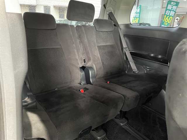 トヨタ ヴェルファイア 2．4Z プラチナセレⅡ ゴールド 岡山県 2011(平23)年 10.8万km ブラック 登録時走行距離107601km/フリップダウン後席モニター/社外SDナビ/(AM/FM/DISC/TV/BT)/クルーズコントロール/両側パワースライドドア/電動リアゲート/ビルトインETC/バックカメラ/ウォークスルー/MTモード付AT/プッシュスタート/スマートキー/スペアキー/純正１８インチアルミホイール/キセノンヘッドライト